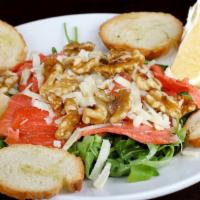 Salmon Salad · Arugula, smoked salmon, walnuts, pecorino cheese, and extra virgin olive oil. Served with br...