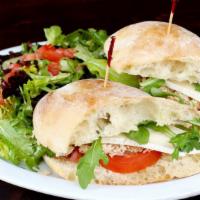 Pollo Sandwich · Chicken breast, tomatoes brie and gorgonzola. Served with mix green and arugula.