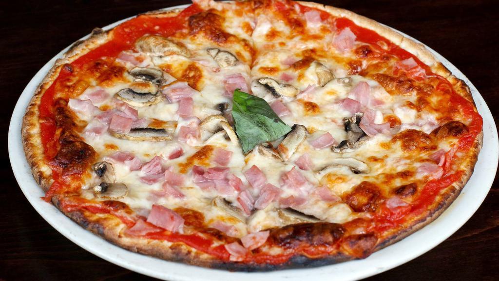 Funghi Pizza · Tomato sauce, mozzarella, mushrooms, ham, and basil.