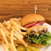 Cheeseburger Meal · 6 oz angus ground chuck burger topped with cheddar cheese served with French fries