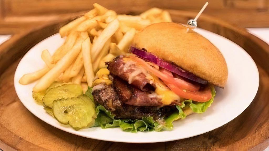 Turkey Bacon Meal · 6 oz angus ground chuck burger topped with thick cut turkey bacon, cheddar cheese served with French fries