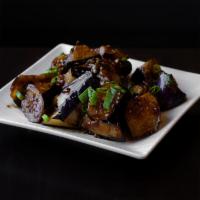 Eggplant Garlic · Sautéed eggplant with garlic, ginger, scallions, basil, soy sauce and dried chilies.