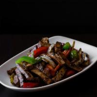 Black Pepper Tofu · Marinated tofu with onion, red and green bell peppers, celery, carrots, oyster sauce, garlic...