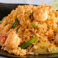 75. Champa's Fried Rice · Shrimp fried rice cooked in tom yum sauce with eggs and onions.