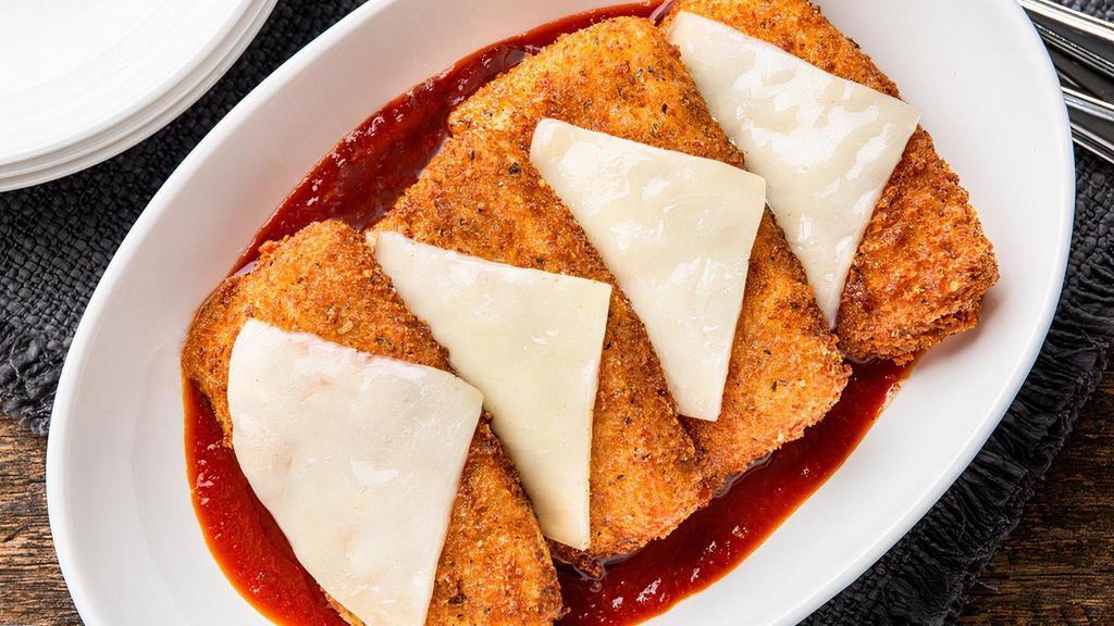 Mozzarella Marinara · Four large slices of mozzarella breaded and fried, then topped with sliced provolone and placed in marinara for dipping.