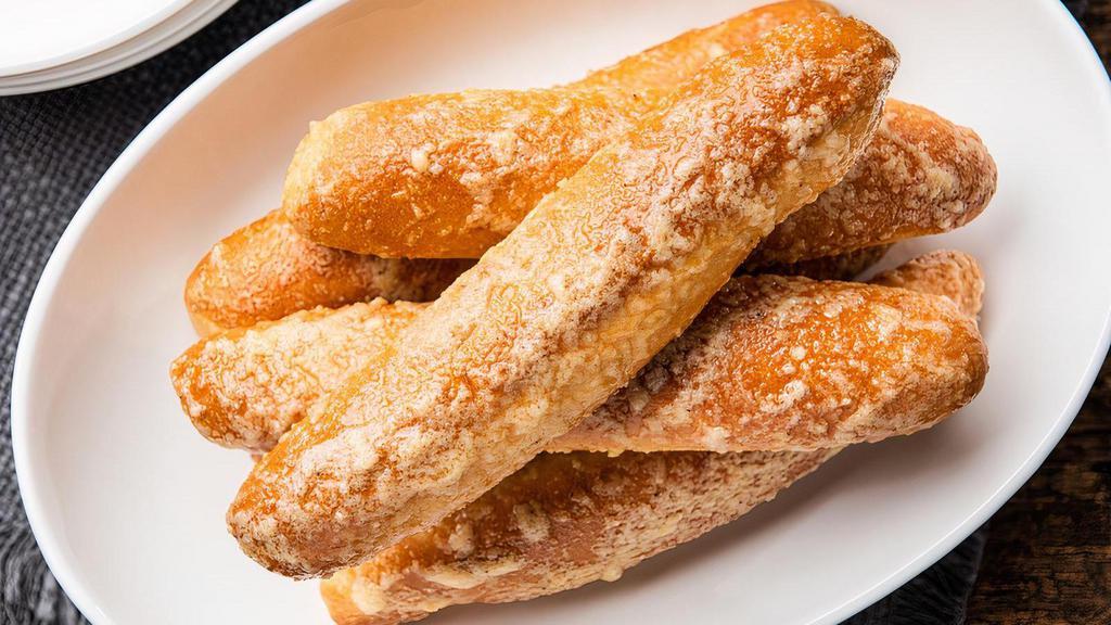 Fresh Baked Breadsticks · Six breadsticks toasted to perfection and finished with a brushed buttering.