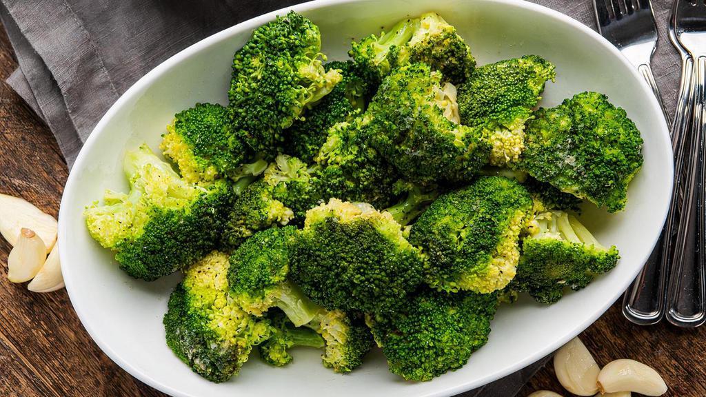 Garlic Butter Broccoli · Steamed to be crisp yet tender, then drizzled with garlic butter.