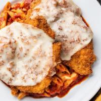 Chicken Parmesan · Pounded chicken covered with seasoned breadcrumbs and fried to perfection. We top two portio...