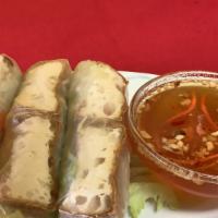 D1 :vegetarian spring Roll  · Fried tofu,lettuce,vermicelli noodles ,fresh mint rolled into rice paper