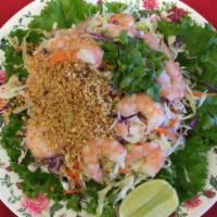 A2. Shrimp Salad · Shredded cabbage with mint in a vinaigrette dressing, shrimp, carrots, daikon, and crushed p...