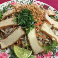 A3: ToFu  salad · Shredded cabbage with mint in a vinaigrette dressing, beef, carrots, daikon and crushed pean...