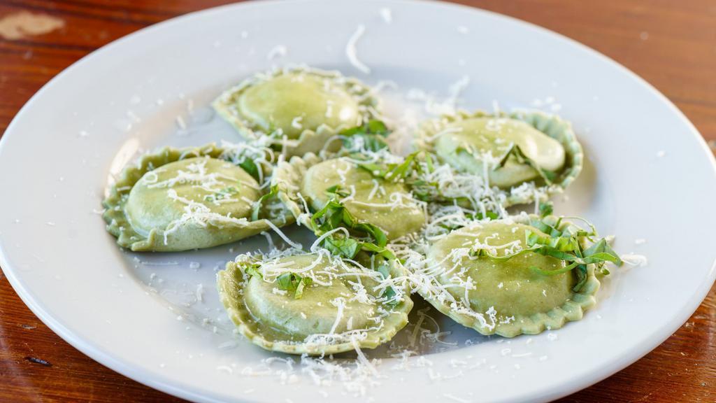 Ravioli · 7 pieces. Choose one with your choice of sauce. Spinach and artichoke. Served with Creamy Pesto Fresh Homemade Bread