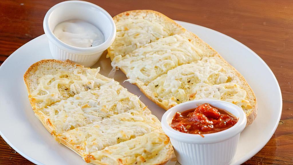 Garlic bread with cheese  · served with marinara sauce