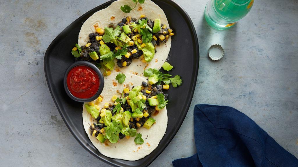 Sprout (Vegan) · Refried black beans, fresh avocado, diced red onion, roasted corn, cilantro, salt & pepper on a flour tortilla.

Plan for 2-3 per person.