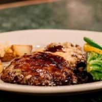 Blackberries & Brandy Chicken Breast · Breaded chicken breast, baked with ginger, parmesan cheese and a brown sugar crust. Served w...