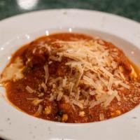Bruno S Homemade Meat Lasagna · Layered with Italian sausage, ground beef, spinach and egg pasta topped with four cheeses an...