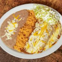 Enchiladas Dinner · Top menu item. Two corn tortillas stuffed with cheese, chicken or beef with red or green sau...