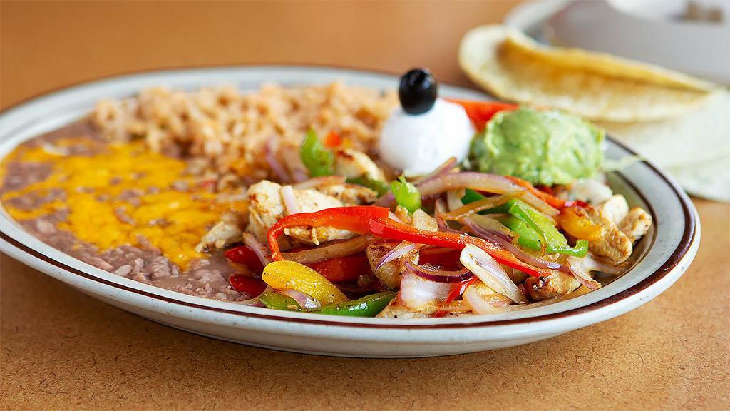 Fajitas · Sauteed with bell peppers, onions, tomatoes and garlic.