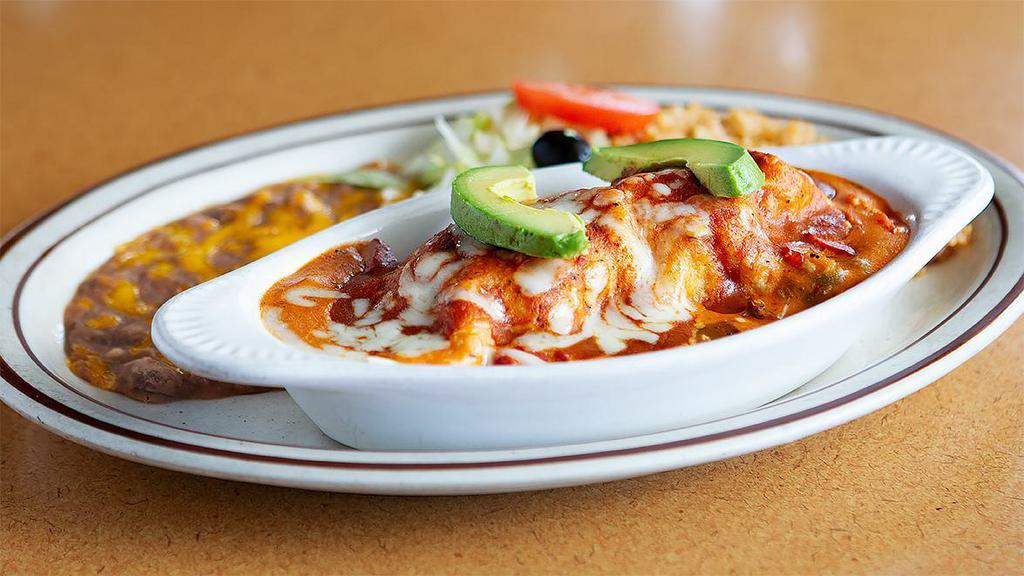 Enchilada Mazatlan · Yummy prawns sauteed with creamy garlic
 sauce, rolled in a flour tortilla. Topped with Jack
cheese, served with rice, beans and avocado slices.