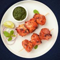 Boti, Wait  A Minute · Boneless pieces of our chicken cubes marinated in a yoghurt and baked in a tandoor clay oven