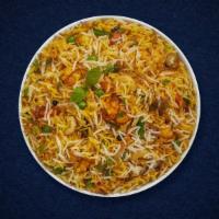 Veggie Impact Biryani · Spiced seasoned vegetables cooked with Indian spices and basmati rice. Served with house rai...