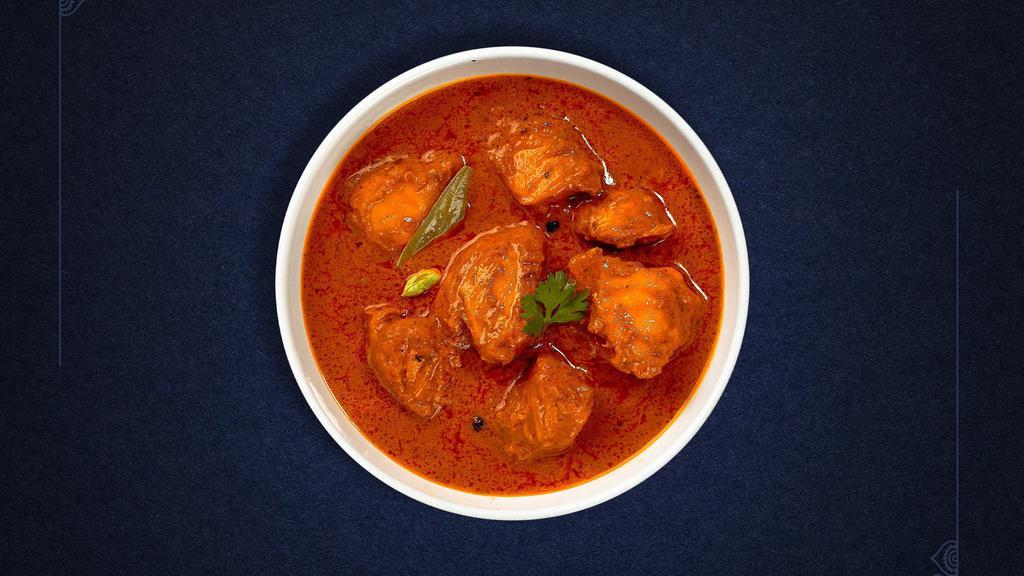 Chicken Dickens Curry · Free range chicken breast in a tomato based onion gravy with freshly ground spices.