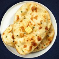 Stuffed Cluckin' Naan · Freshly baked bread stuffed with minced chicken cooked in a clay oven.