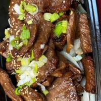 Galbee The Original · Beef short ribs marinated for 72 hours with soy sauce, garlic, sesame oil, and onion. Served...