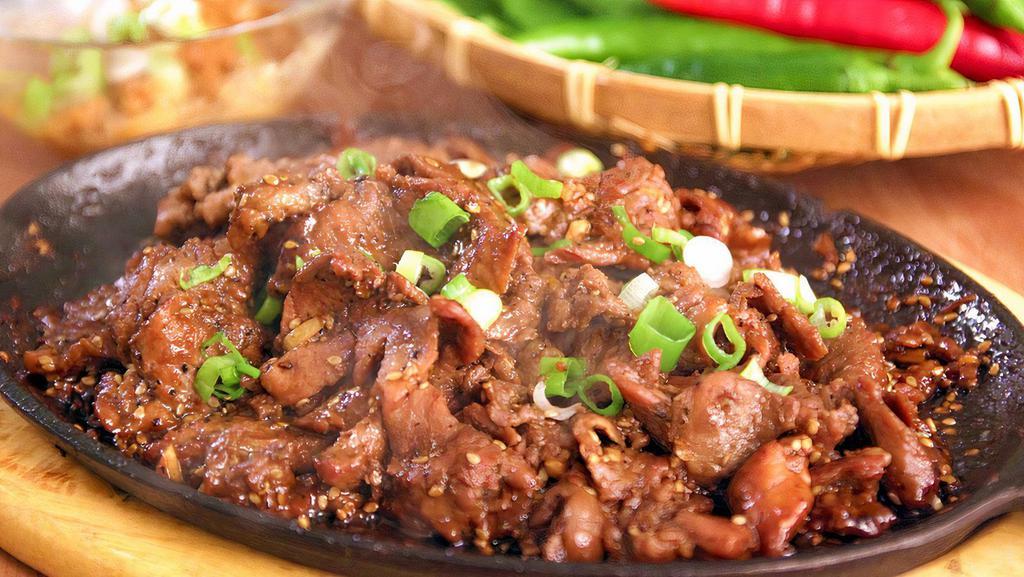 Bulgogi -Beef  · Thinly sliced beef marinated in our original marinade. Served with rice and side dishes.