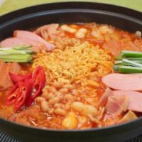 Army Stew · Korean spicy stew with Ham, spam, kimchi, rice-cake, ramen,etc.