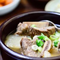 Beef Short Rib Soup · English cut beef short rib with green onion, egg, and clear yam noodles in beef broth.