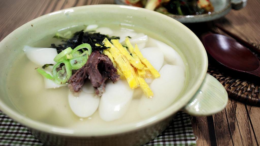Ddok Guk Soup * (No rice served) · Vegetarian. Sliced rice cake with green onion and egg in beef broth.