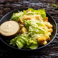 Classic Caesar Salad · Crisp romaine and classic house made caesar dressing with croutons and Parmesan.