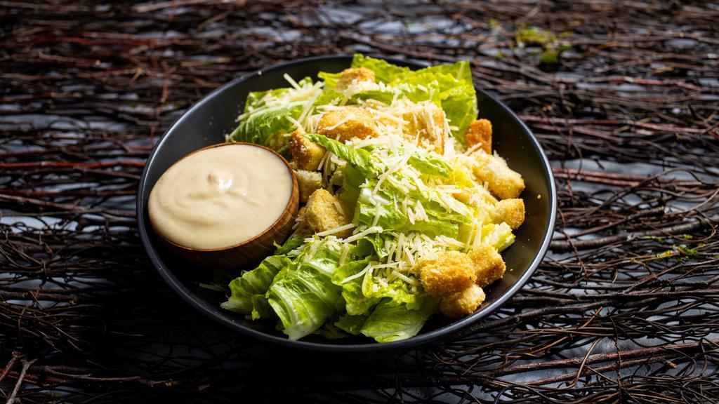 Classic Caesar Salad · Crisp romaine and classic house made caesar dressing with croutons and Parmesan.