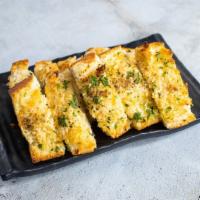Garlic Cheese Bread · Add garlic cheese bread to go with your pasta. The perfect pairing.