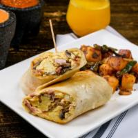 Breakfast Burrito · scrambled eggs, tomato, onion, mushroom, bacon, sausage, jack and cheddar cheese.served with...