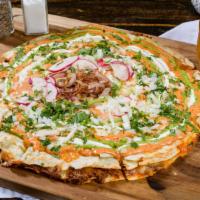 Grilled Chicken Pizzadilla · Grilled Chicken, Asadero, Oaxaca, jack cheese, topped w/ avocado sauce, sour cream, chipotle...