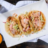 Shrimp Tacos (3) · Grilled shrimp, jack cheese, aioli, greens onions, radishes, cabagge.