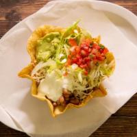 Taco Salad · Crispy flour tortilla shell with rice, bean, choice of meat, cheese, lettuce, sour cream, gu...