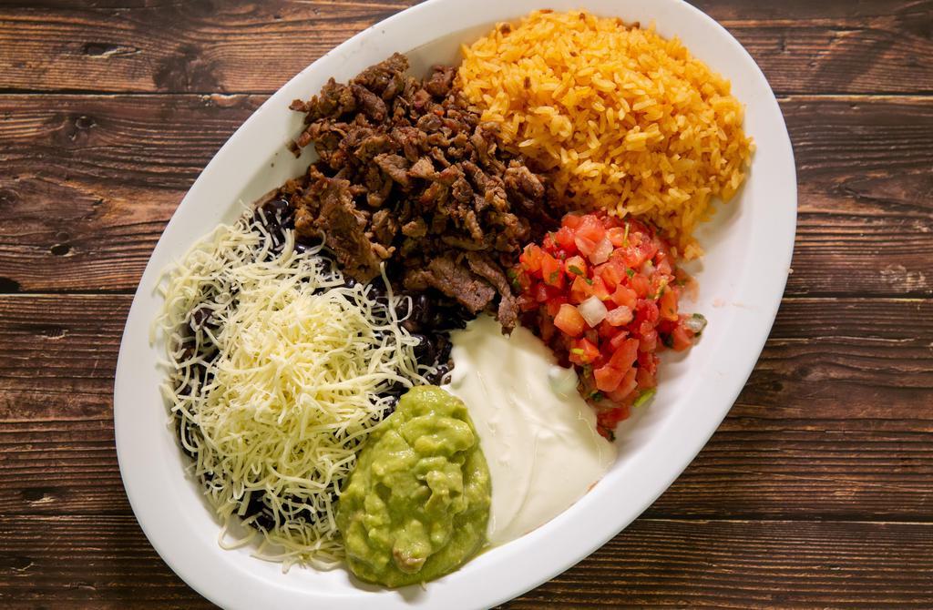 Dinner Plate · Rice, bean, choice of meat, salsa, sour cream, guacamole, & tortillas.