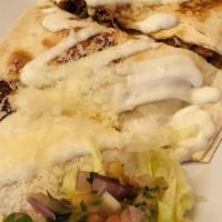 Carne Asada Quesadilla · Flour tortilla filled with melted cheese and carne asada - steak.