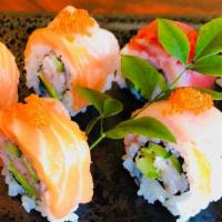 Rainbow Roll · Crab, avocado, cucumber roll with tuna, salmon, yellow tail on top (7pc)