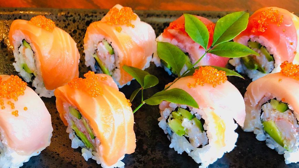 Rainbow Roll · Crab, avocado, cucumber roll with tuna, salmon, yellow tail on top (7pc)