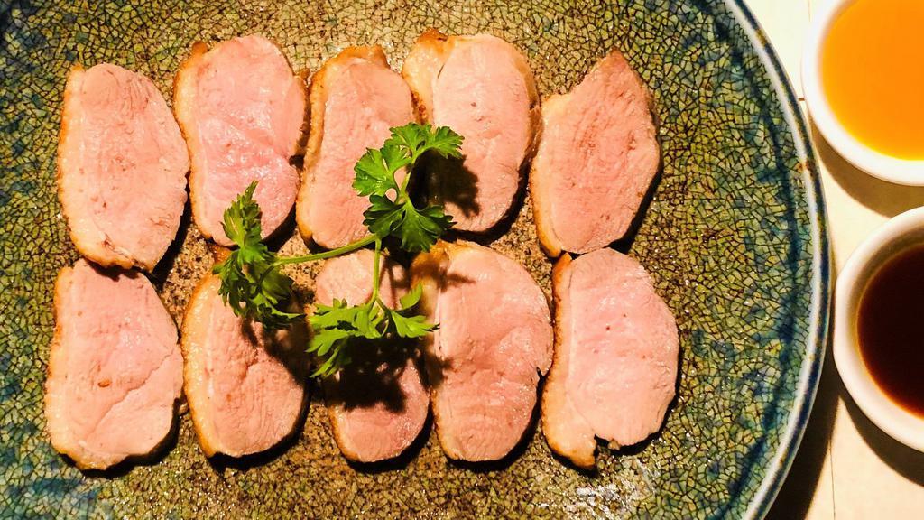 Roast Duck  · Slowly cooked duck breast with mango sauce