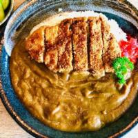 Tonkatsu Curry · Breaded deep fried pork cutlet with vegetables curry and white rice