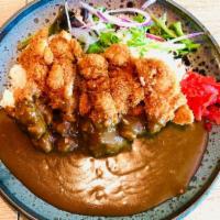Chicken katsu Curry · Breaded deep fried chicken cutlet with vegetables curry and white rice