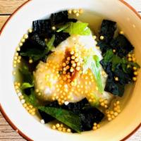 Ume Cha   · Rice ball in plain dashi soup with dry plum
