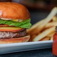 Pour House Gourmet Burger · Beef Angus patty charbroiled in low heat. Served with choice of your cheese, lettuce, onion,...