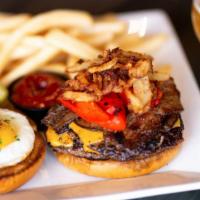 Hangover Burger w/Sea-Salt Fries · Harris Ranch Beef Angus patty, beef chilis, sauté mushroom, beer-soaked bacon, and sunny-sid...