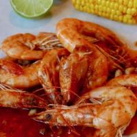 Louisiana Cajun Shrimp · 1 lb. whole shrimp tossed in butter, fresh chopped garlic, Cajun spices and Louisiana sauces...